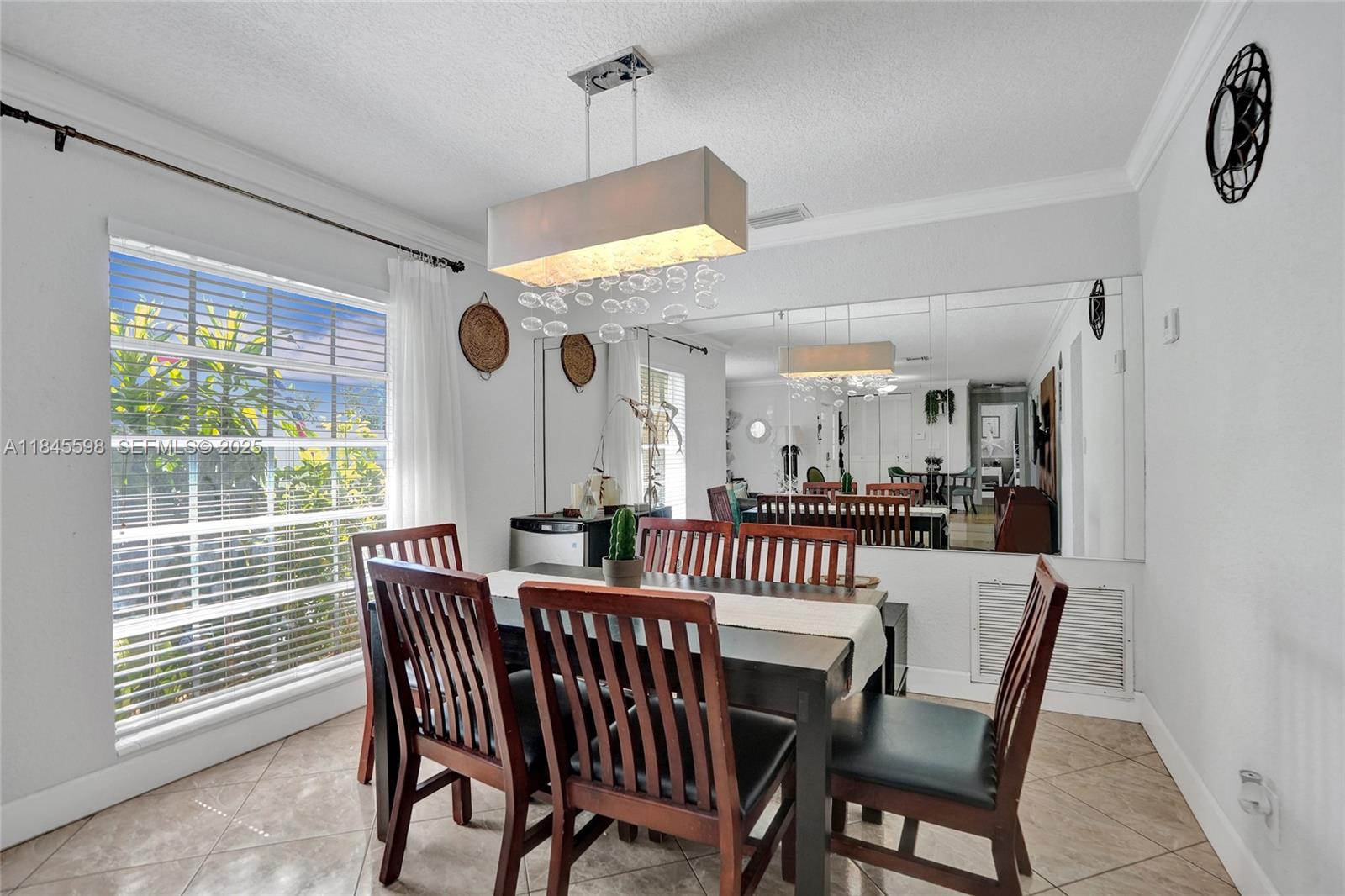 520 Southwest 62nd Avenue Margate, FL 33068 - Photo 25 of 34 a view of a dining room with furniture