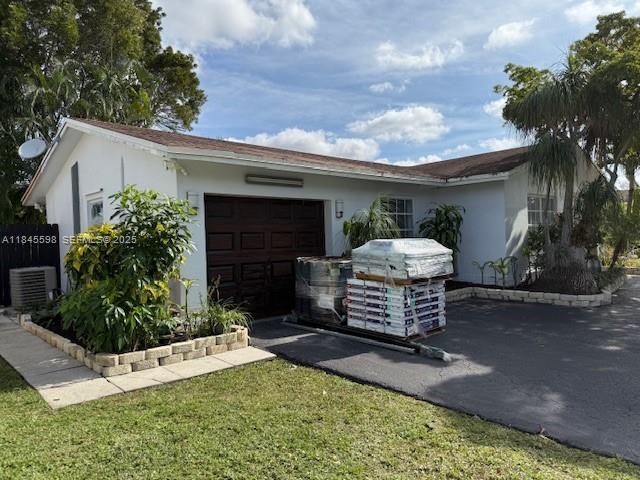 520 Southwest 62nd Avenue Margate, FL 33068 - Photo 34 of 34 a front view of a house with garden