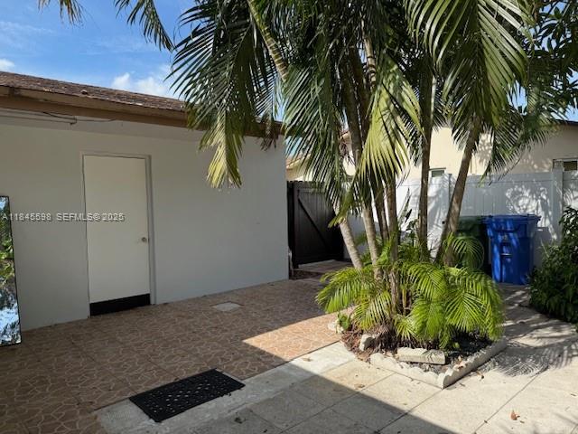 520 Southwest 62nd Avenue Margate, FL 33068 - Photo 9 of 34 a potted plant sitting in front of a house