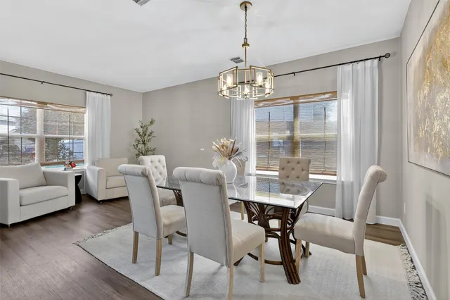 a kitchen with white cabinets and a sink