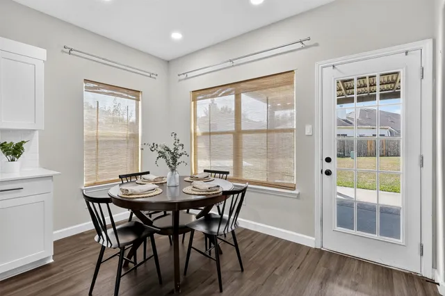 a stove top oven sitting inside of a kitchen