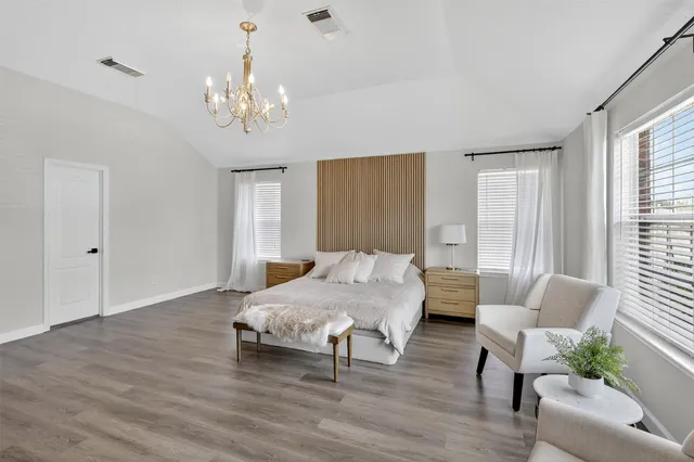 a view of a house with a yard and deck