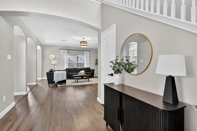 a view of entryway with wooden floor