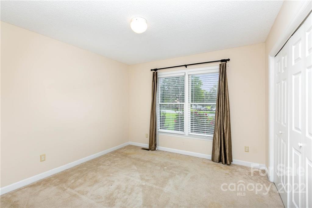 901 Stevens Road Monroe, NC 28110 - Photo 19 of 28 a view of an empty room with a balcony