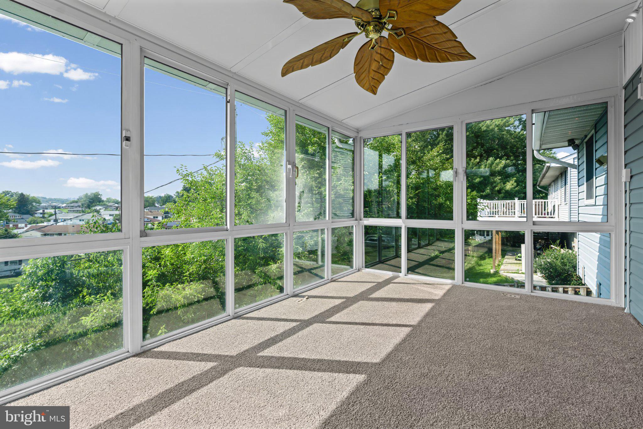1317 Roxboro Road Baltimore, MD 21237 - Photo 10 of 30 Sunlit serenity in a screened porch.