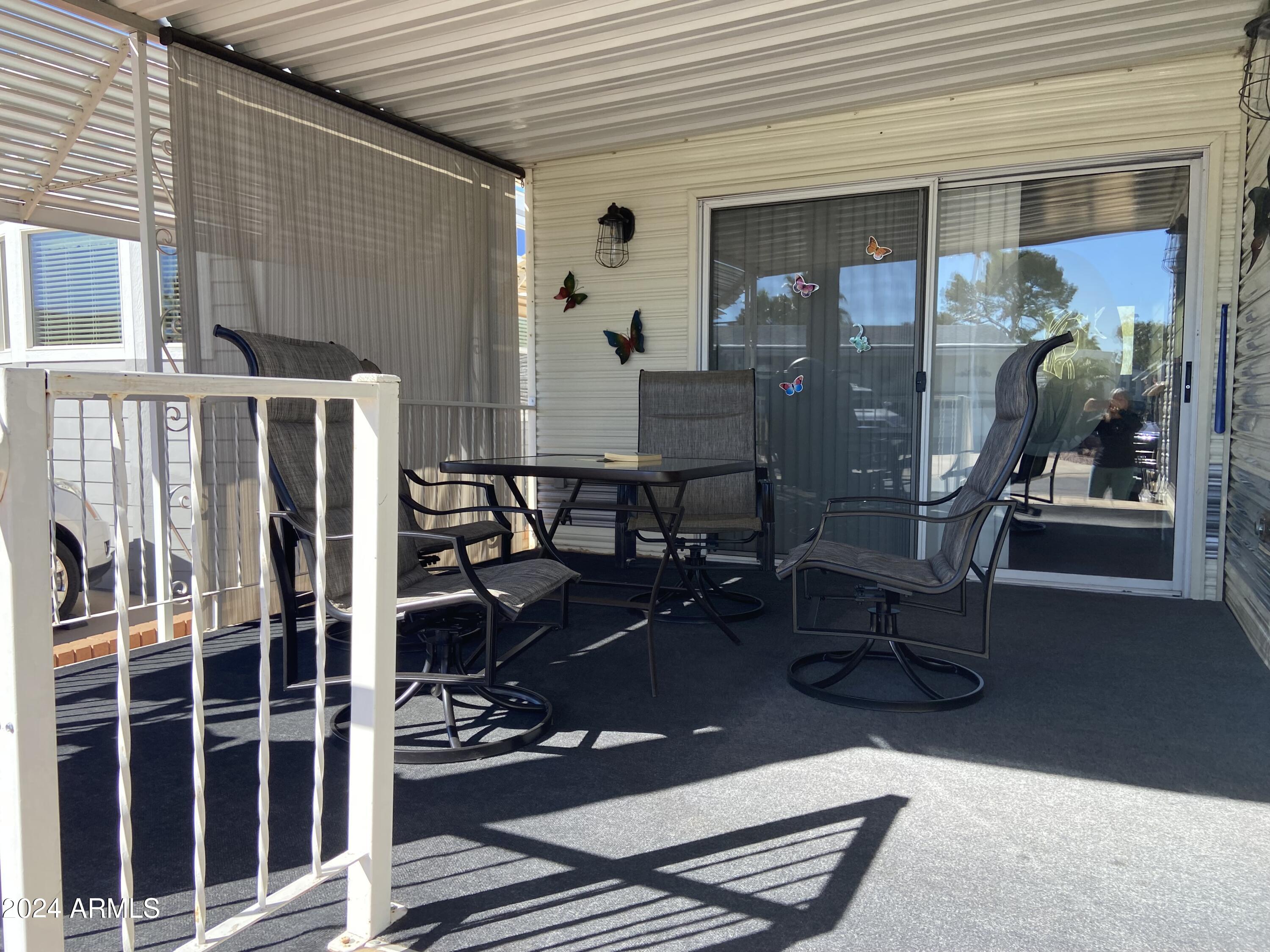 2086 West Klamath Avenue, Unit 86 Apache Junction, AZ 85119 - Photo 15 of 17 a view of a room with gym equipment