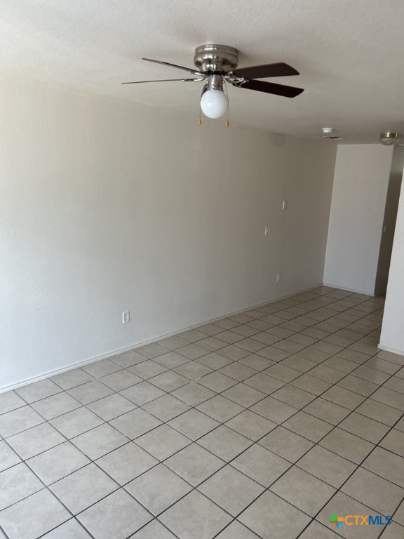 4005 Doraine Court, Unit C Killeen, TX 76549 - Photo 2 of 10 an empty room with a wooden door