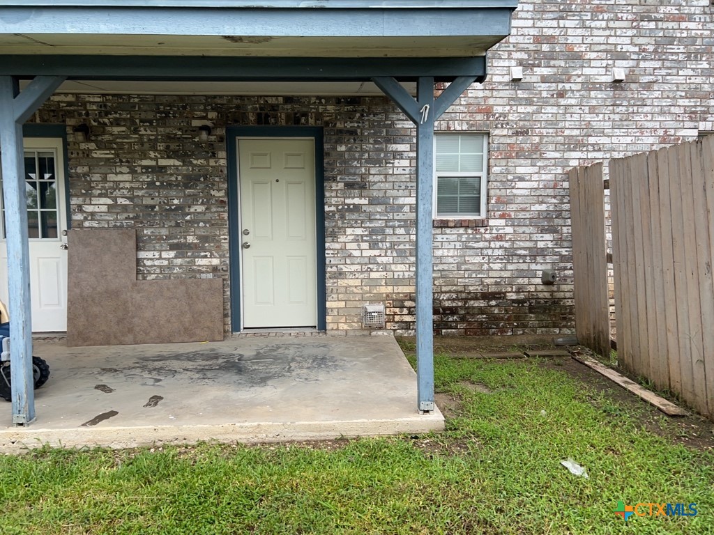 4005 Doraine Court, Unit C Killeen, TX 76549 - Photo 9 of 10 a front view of a house with a garden