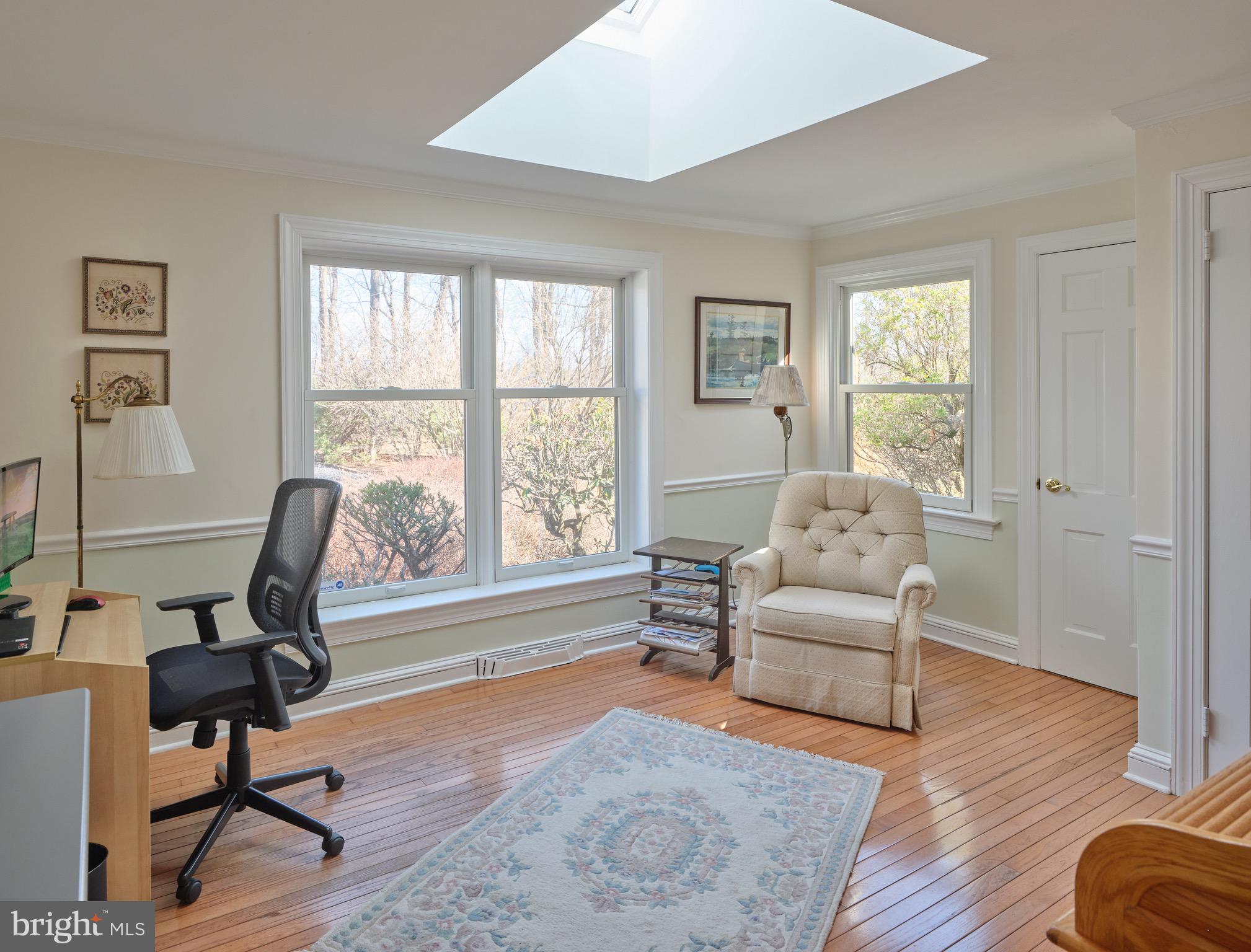 4990 Point Pleasant Pike Doylestown, PA 18902 - Photo 13 of 38 a living room with furniture floor to ceiling window and wooden floor