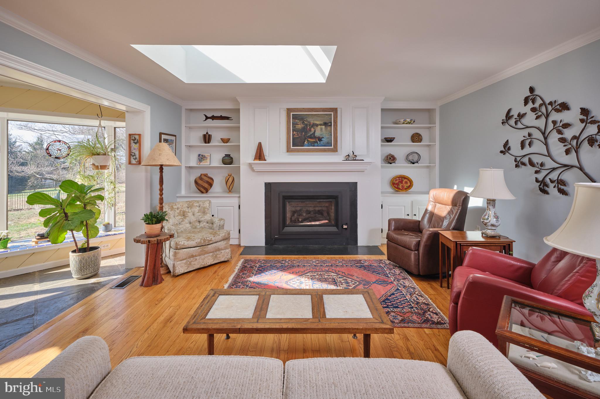 4990 Point Pleasant Pike Doylestown, PA 18902 - Photo 2 of 38 a living room with furniture and a fireplace