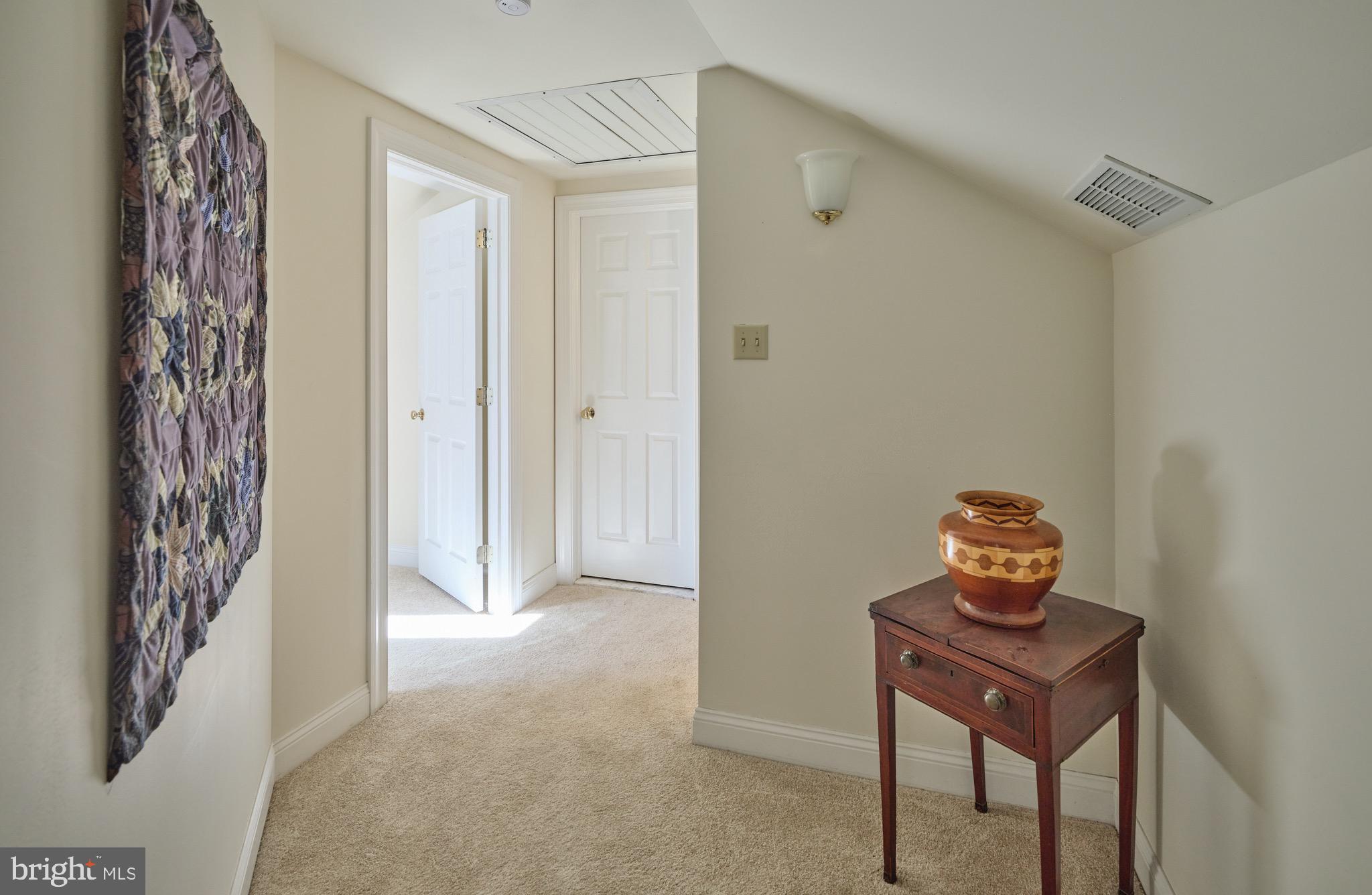 4990 Point Pleasant Pike Doylestown, PA 18902 - Photo 22 of 38 a room with a door and a mirror