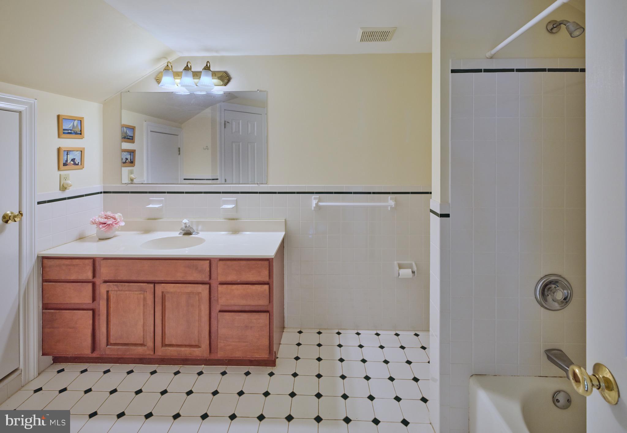4990 Point Pleasant Pike Doylestown, PA 18902 - Photo 24 of 38 a bathroom with a sink a toilet and shower