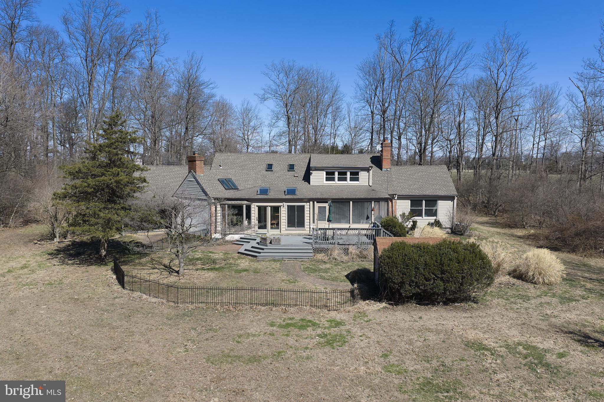 4990 Point Pleasant Pike Doylestown, PA 18902 - Photo 31 of 38 a view of a house with backyard and sitting area