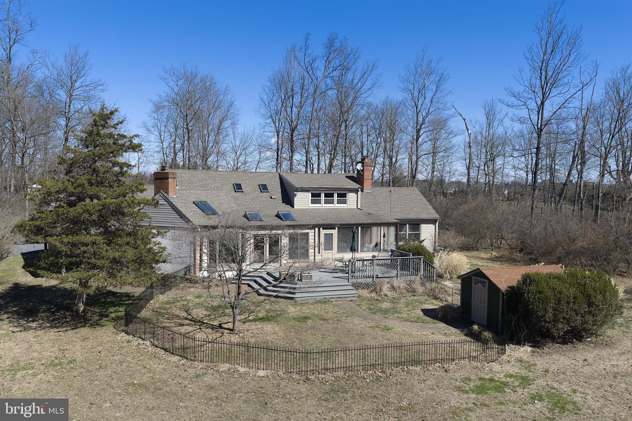 4990 Point Pleasant Pike Doylestown, PA 18902 - Photo 36 of 38 a front view of a house with a yard
