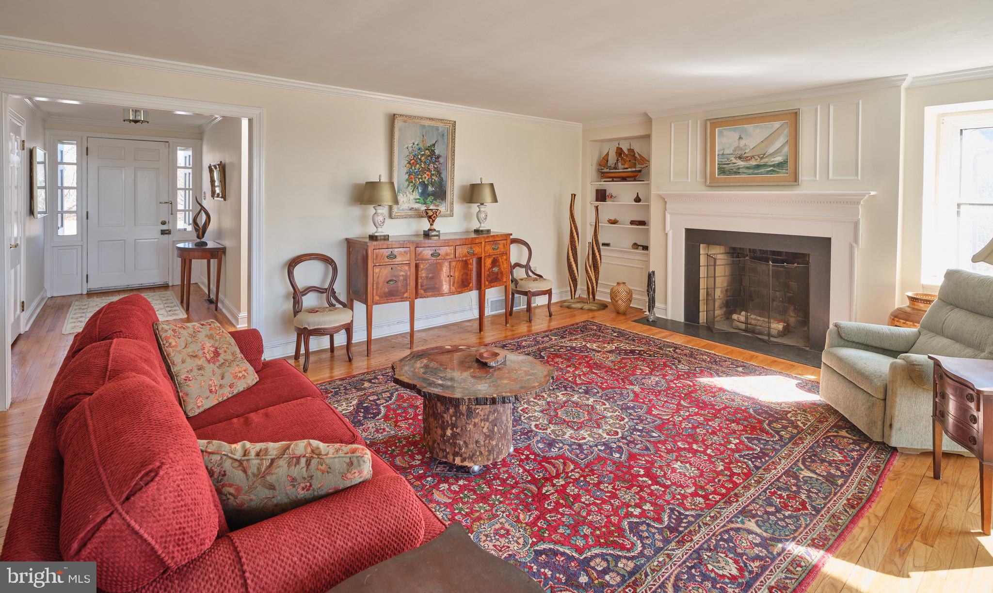 4990 Point Pleasant Pike Doylestown, PA 18902 - Photo 9 of 38 a living room with furniture and a fireplace