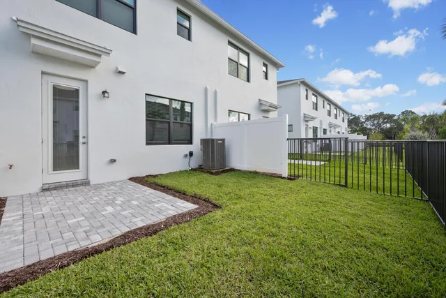 a view of a backyard with a garden
