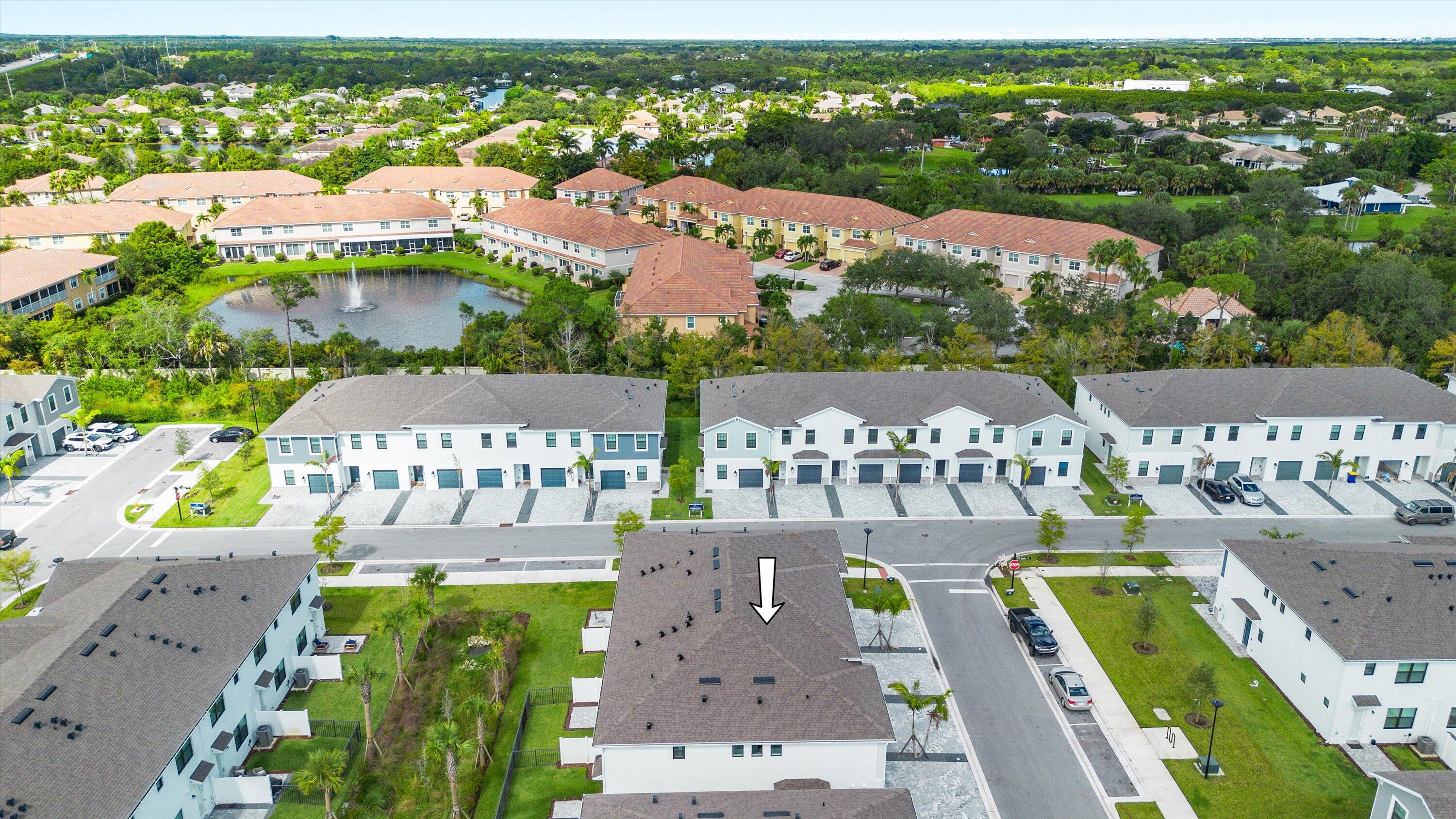 7638 Southwest Lucy Lane Stuart, FL 34997 - Photo 36 of 45 an aerial view of a city with lawn chairs