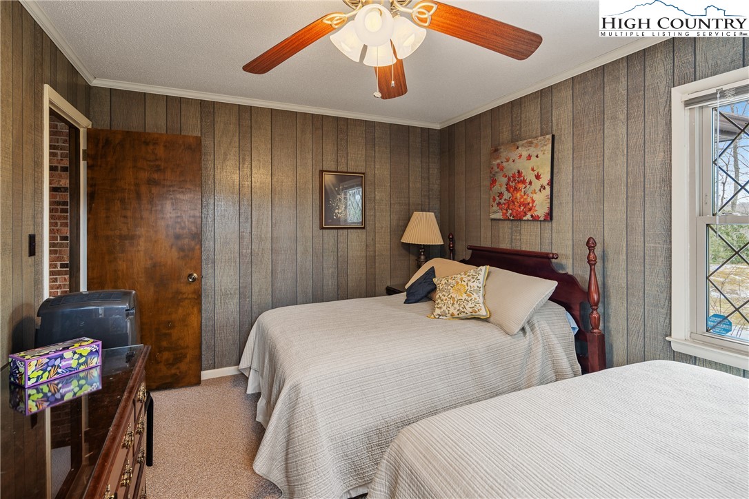 329 Maplewood Circle Boone, NC 28607 - Photo 16 of 46 a bedroom with a bed and a window