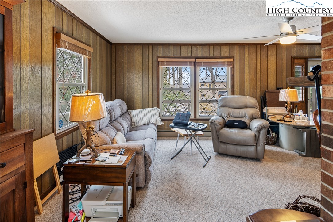 329 Maplewood Circle Boone, NC 28607 - Photo 18 of 46 a living room with furniture and a window