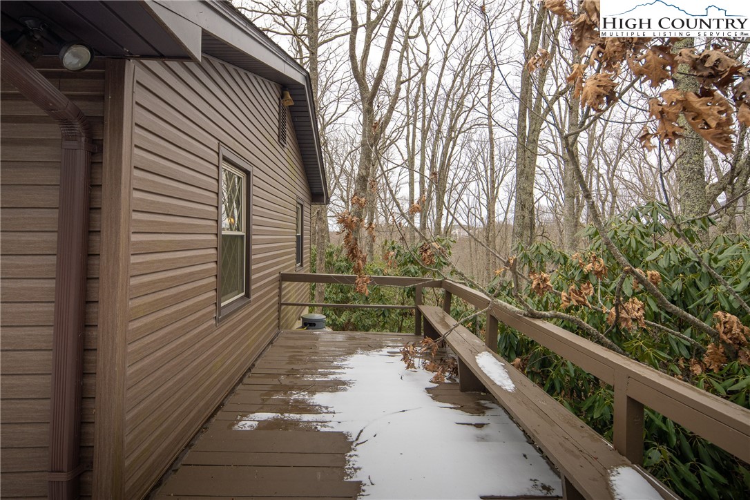 329 Maplewood Circle Boone, NC 28607 - Photo 21 of 46 a view of a balcony with wooden stairs