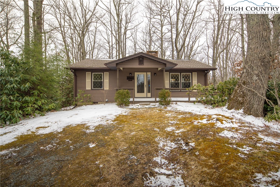 329 Maplewood Circle Boone, NC 28607 - Photo 23 of 46 a front view of a house with a yard