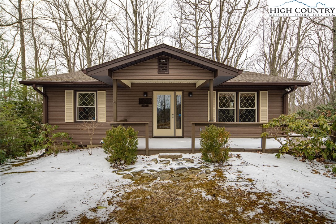 329 Maplewood Circle Boone, NC 28607 - Photo 24 of 46 a front view of a house with garden