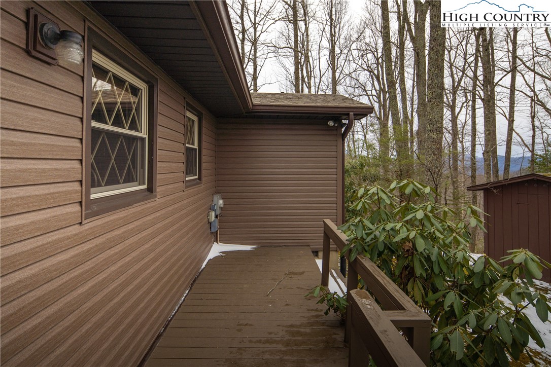 329 Maplewood Circle Boone, NC 28607 - Photo 32 of 46 a house with trees in front of it