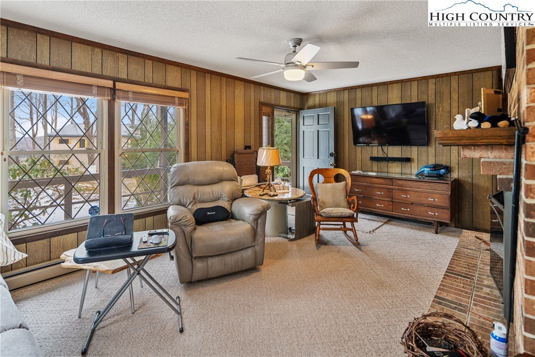 329 Maplewood Circle Boone, NC 28607 - Photo 4 of 46 a living room with furniture and a flat screen tv