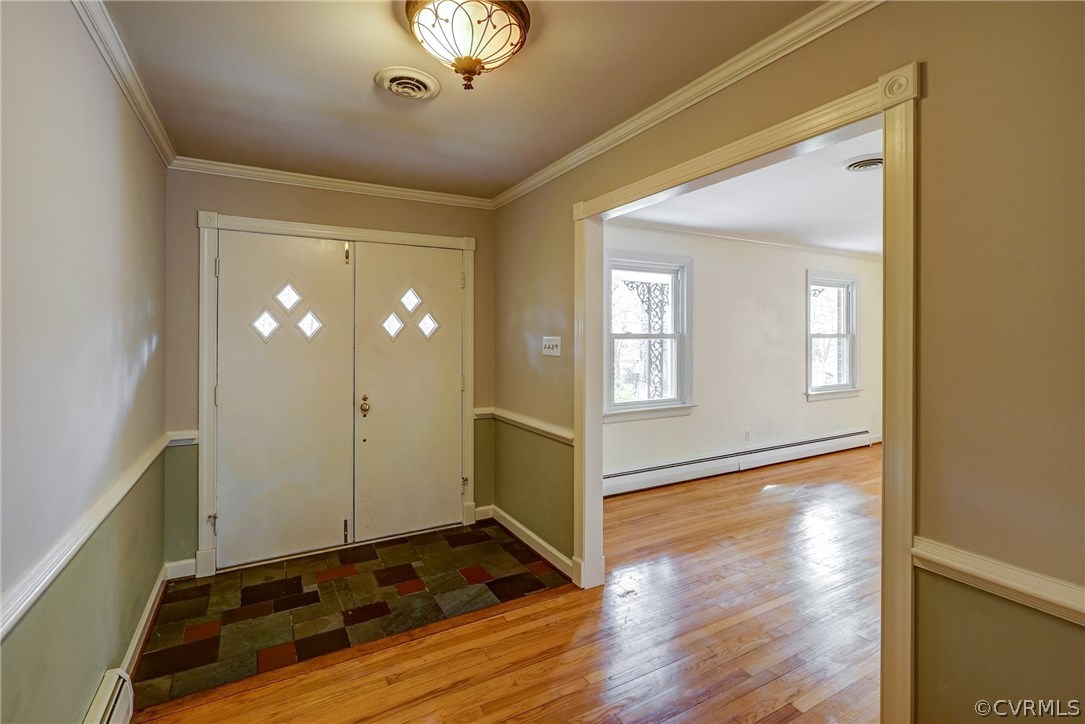 4208 Croatan Road Richmond, VA 23235 - Photo 11 of 50 a view of an empty room and wooden floor