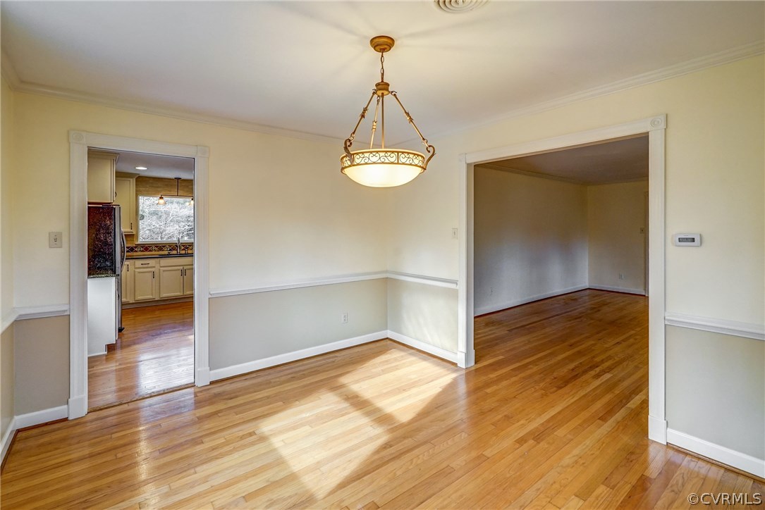 4208 Croatan Road Richmond, VA 23235 - Photo 17 of 50 wooden floor in an empty room with a window