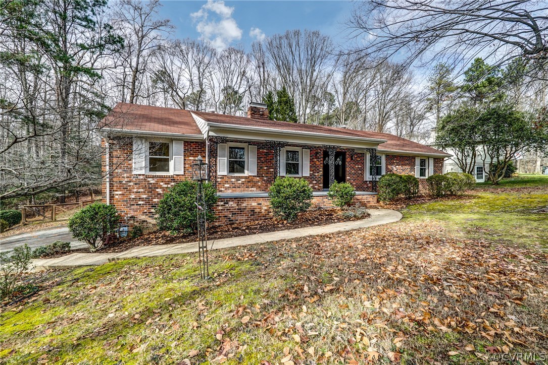 4208 Croatan Road Richmond, VA 23235 - Photo 2 of 50 a front view of a house with garden