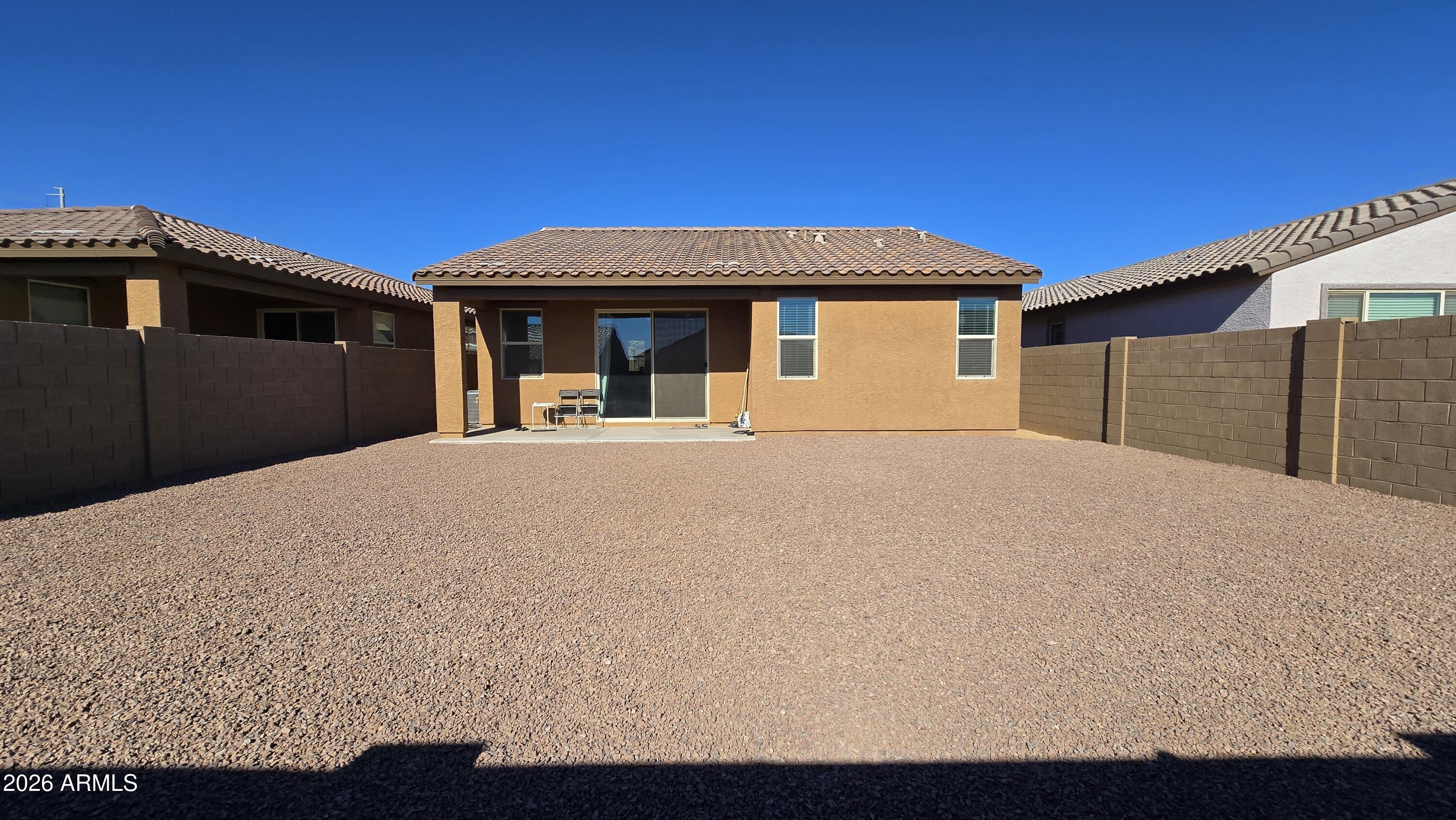 16839 West Evergreen Road Waddell, AZ 85355 - Photo 27 of 28 a front view of a house with a yard