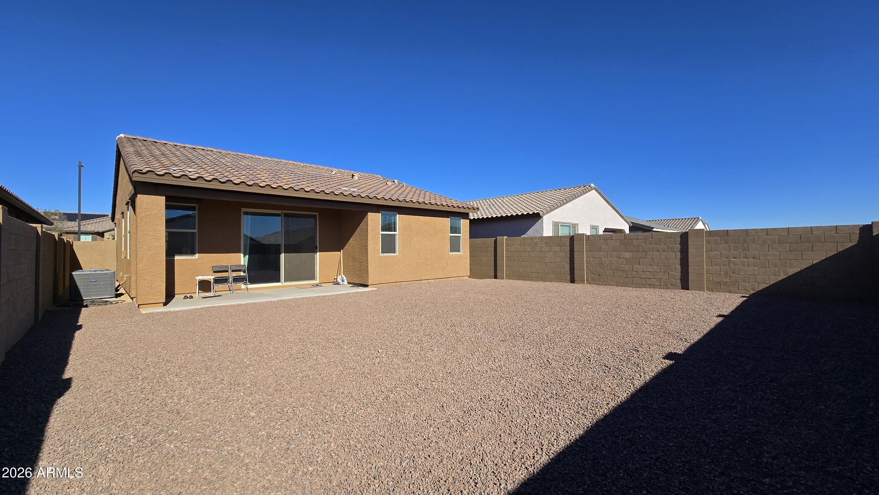 16839 West Evergreen Road Waddell, AZ 85355 - Photo 28 of 28 a view of a house with a backyard