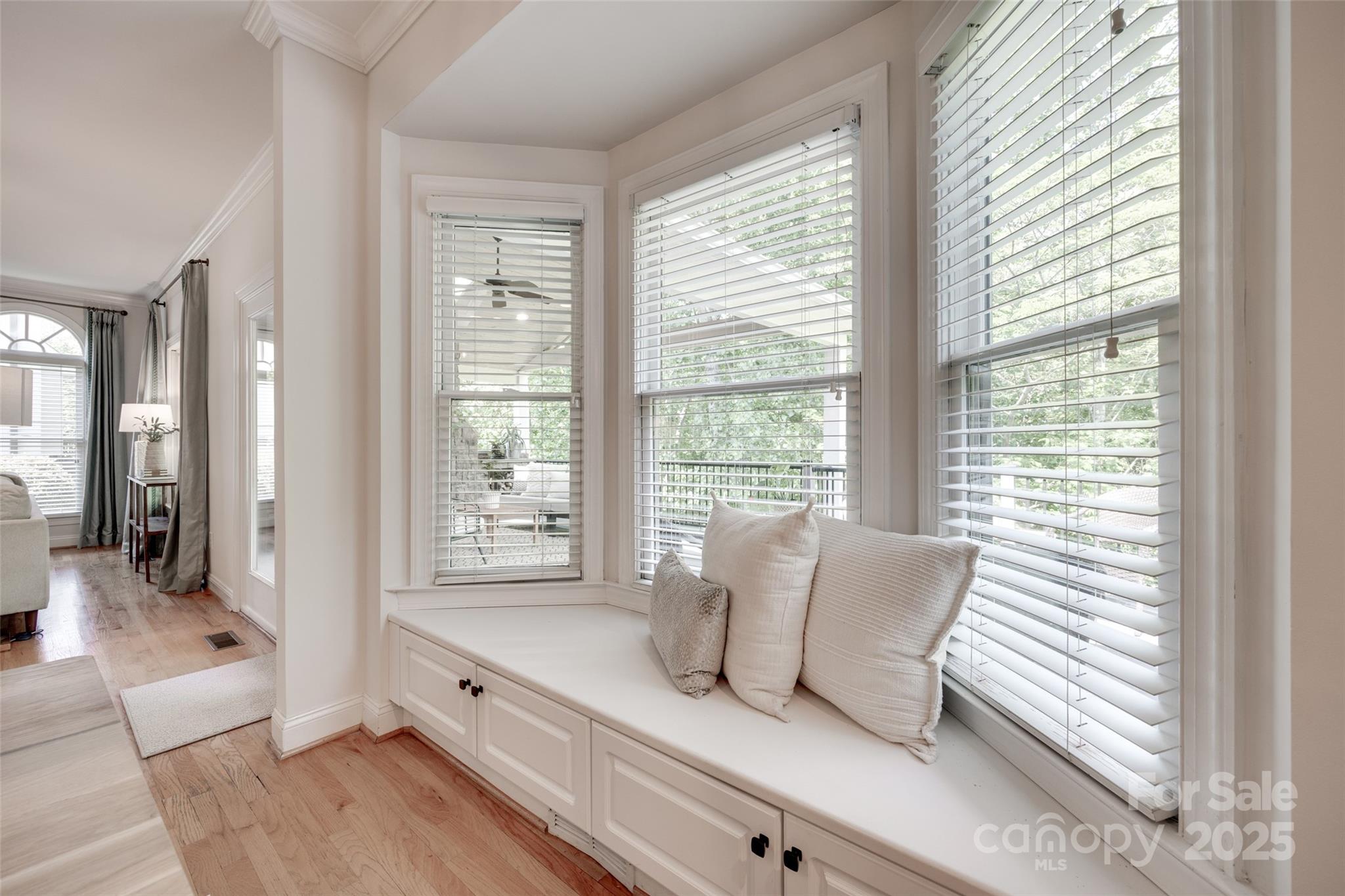 6804 Riesman Lane Charlotte, NC 28210 - Photo 12 of 46 a living room with furniture and large windows