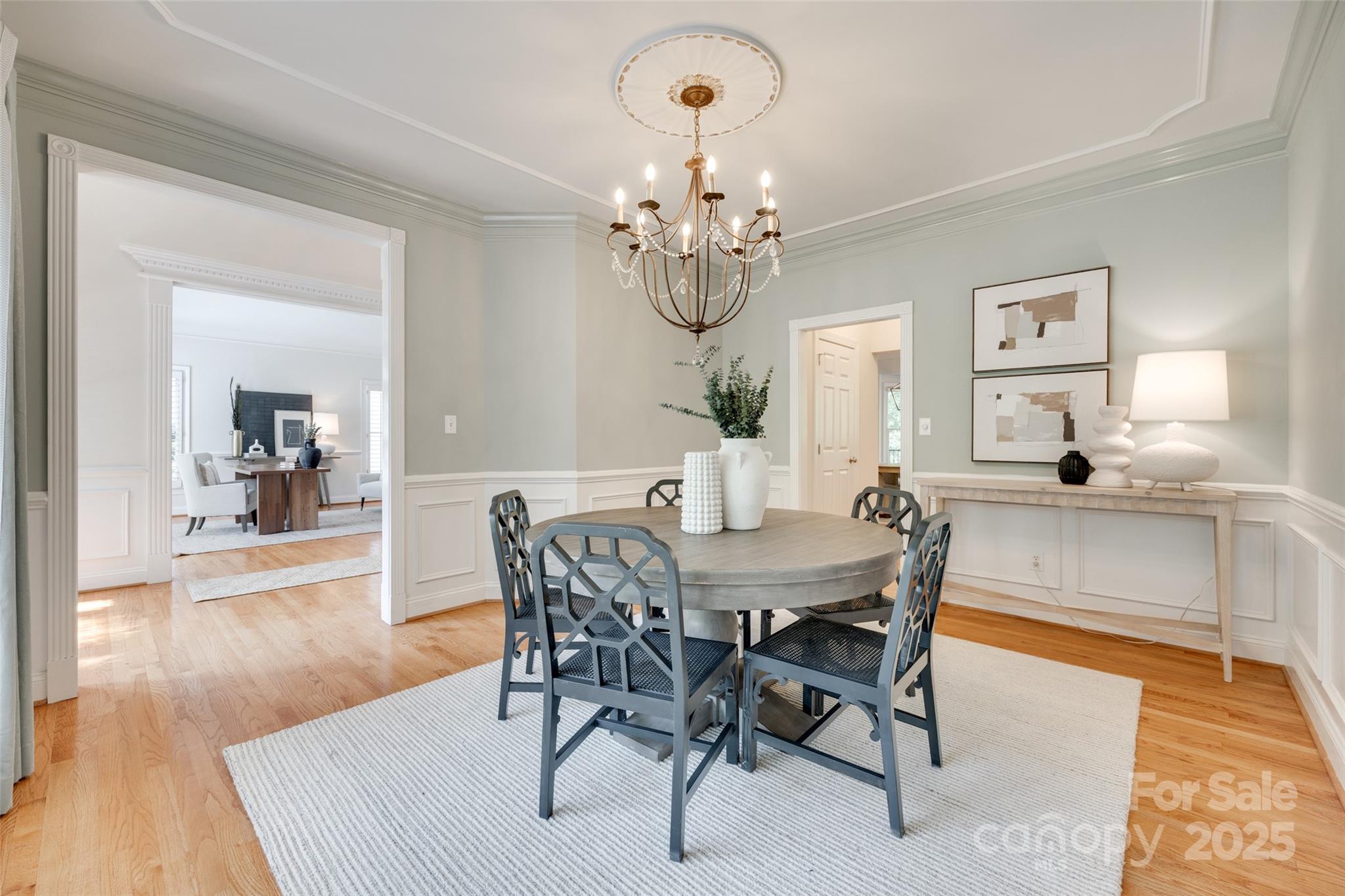 6804 Riesman Lane Charlotte, NC 28210 - Photo 15 of 46 a view of a dining room with furniture and wooden floor