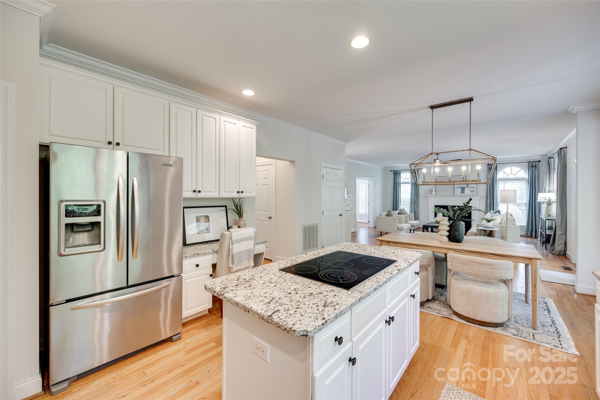6804 Riesman Lane Charlotte, NC 28210 - Photo 18 of 46 a kitchen with refrigerator a stove a sink and a refrigerator