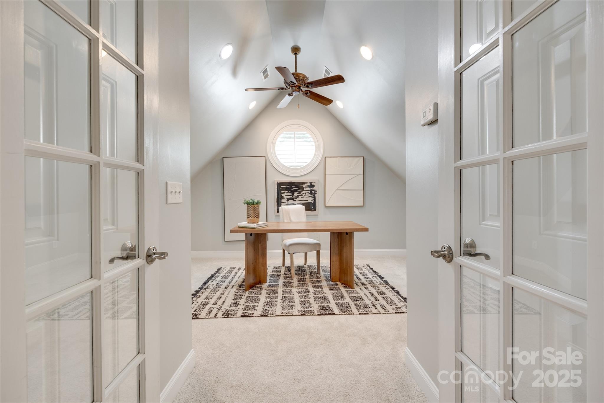 6804 Riesman Lane Charlotte, NC 28210 - Photo 23 of 46 a view of a hallway with furniture and a chandelier