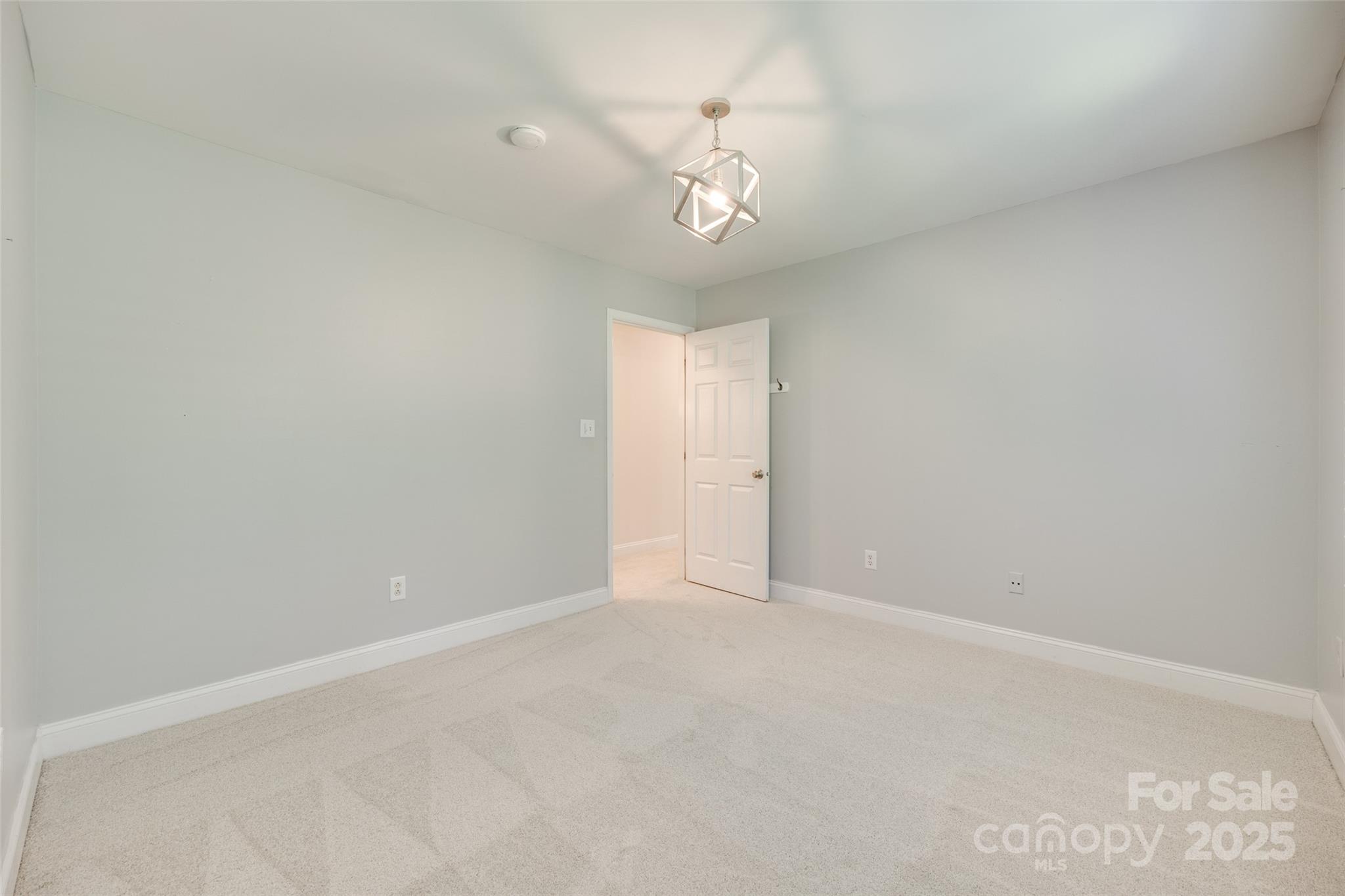 6804 Riesman Lane Charlotte, NC 28210 - Photo 26 of 46 a view of an empty room with a window
