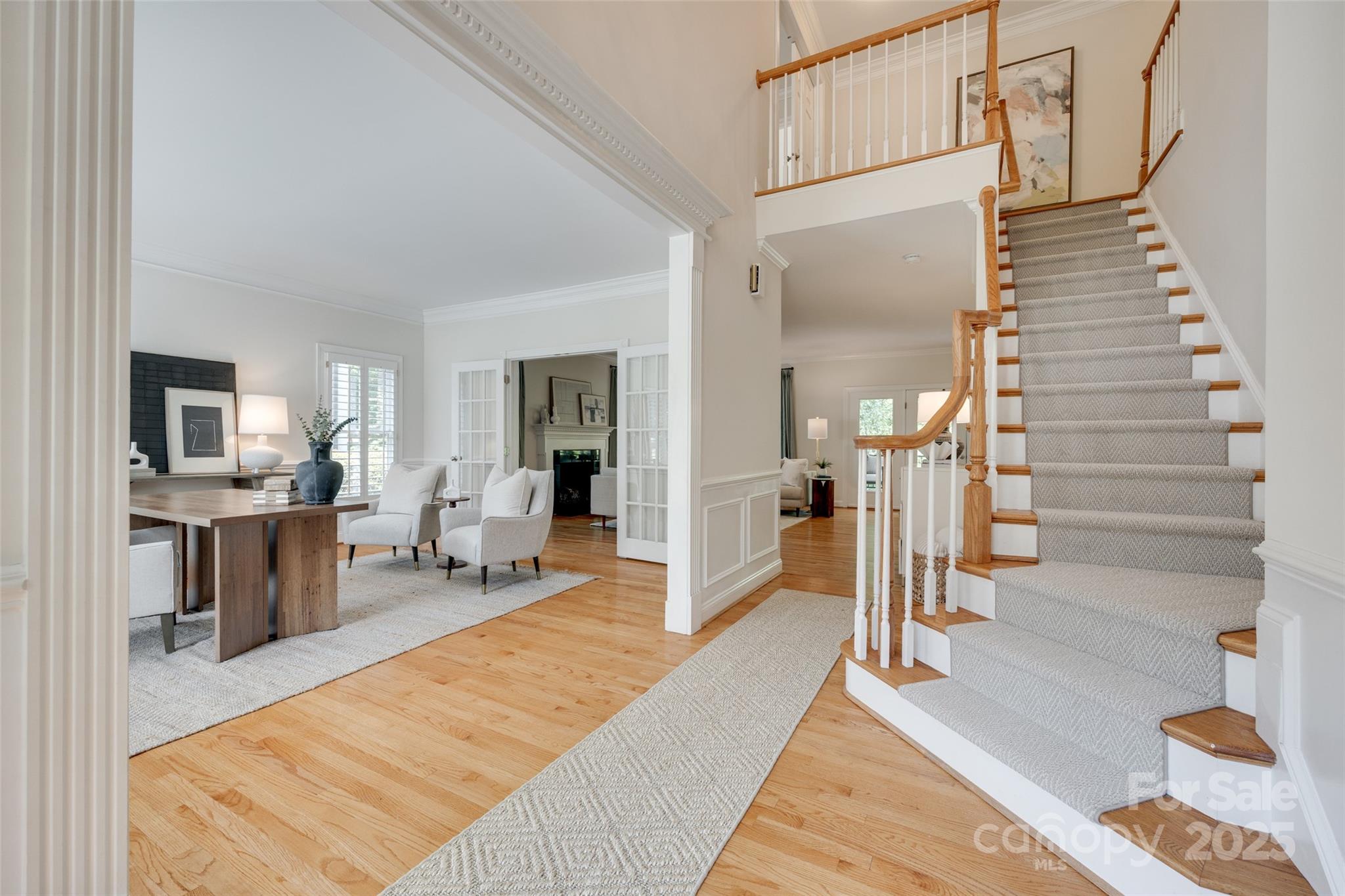 6804 Riesman Lane Charlotte, NC 28210 - Photo 3 of 46 a very nice looking room with a large window and a rug