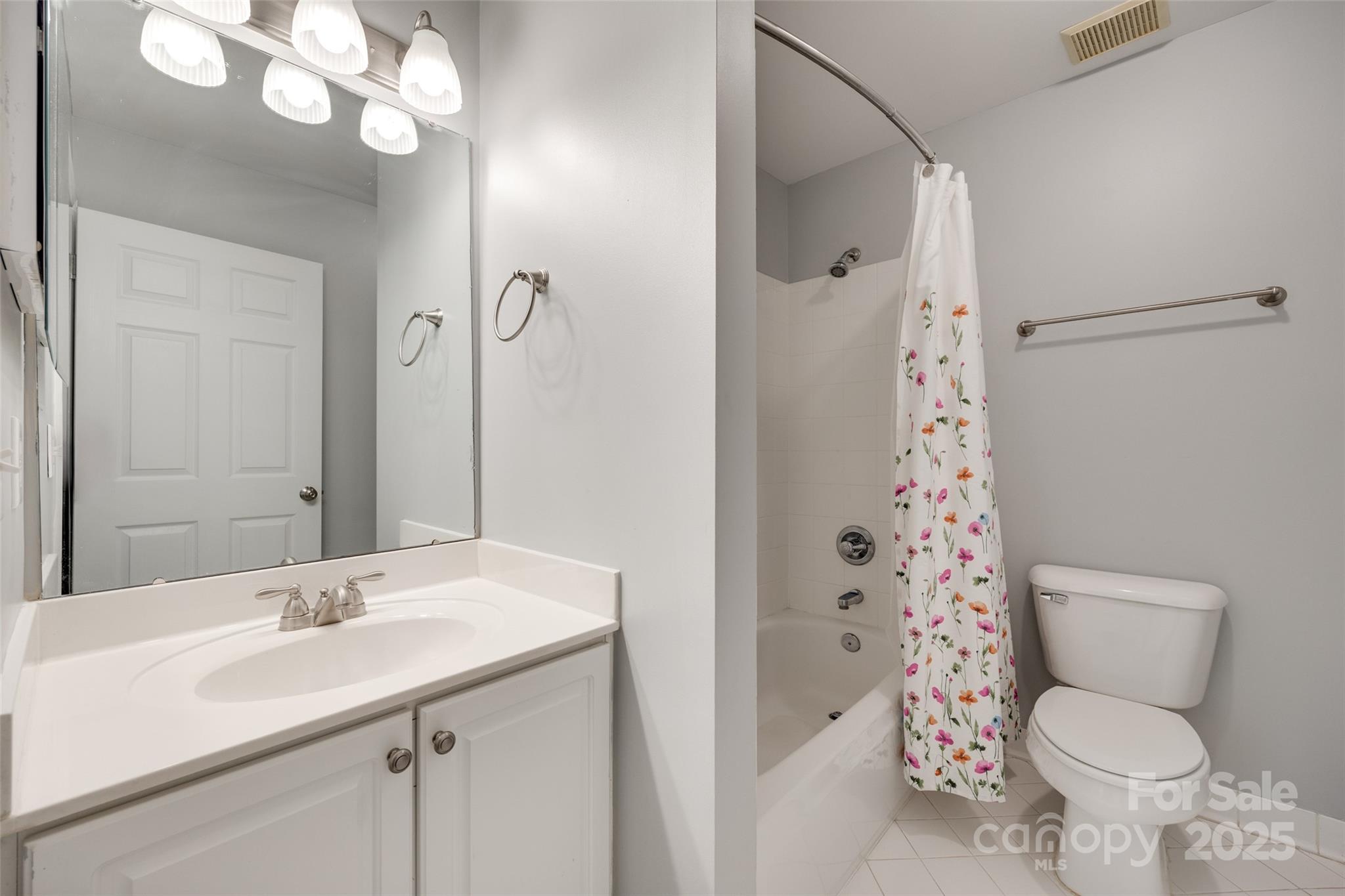 6804 Riesman Lane Charlotte, NC 28210 - Photo 32 of 46 a bathroom with a sink toilet and shower