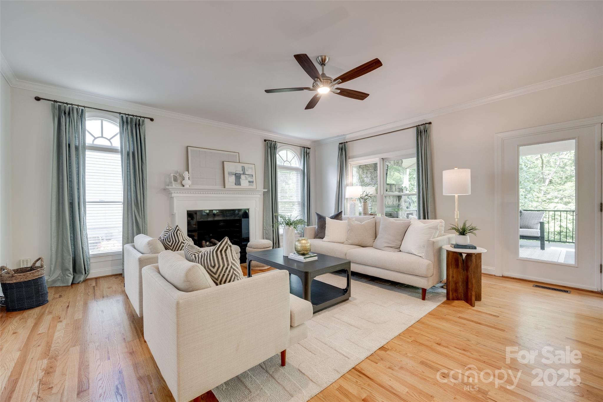6804 Riesman Lane Charlotte, NC 28210 - Photo 6 of 46 a living room with furniture and a fireplace