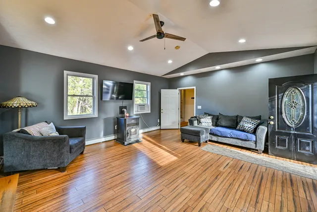 a living room with furniture and a window