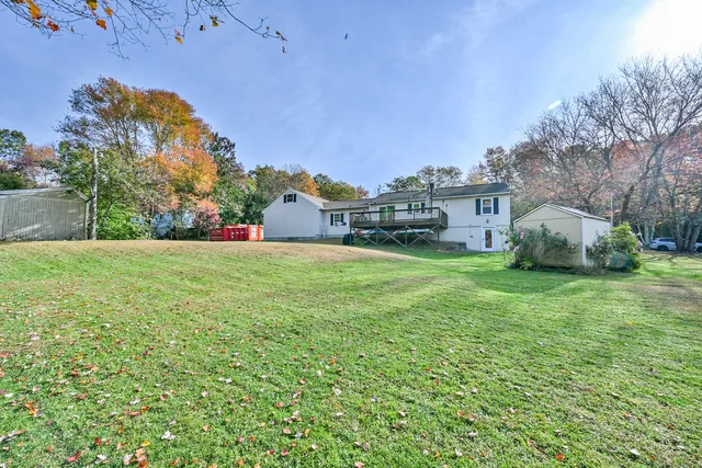 a view of a house with a big yard