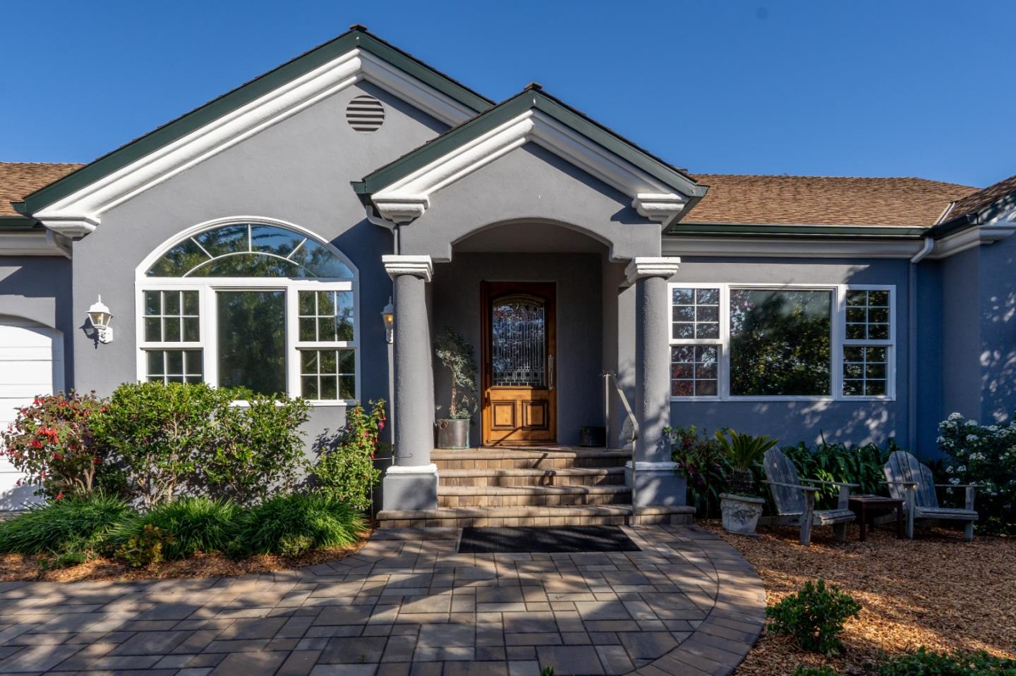 23715 Determine Lane Monterey, CA 93940 - Photo 1 of 43 a front view of a house with garden