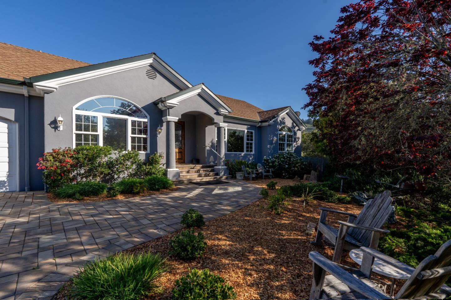 23715 Determine Lane Monterey, CA 93940 - Photo 2 of 43 a front view of a house with garden
