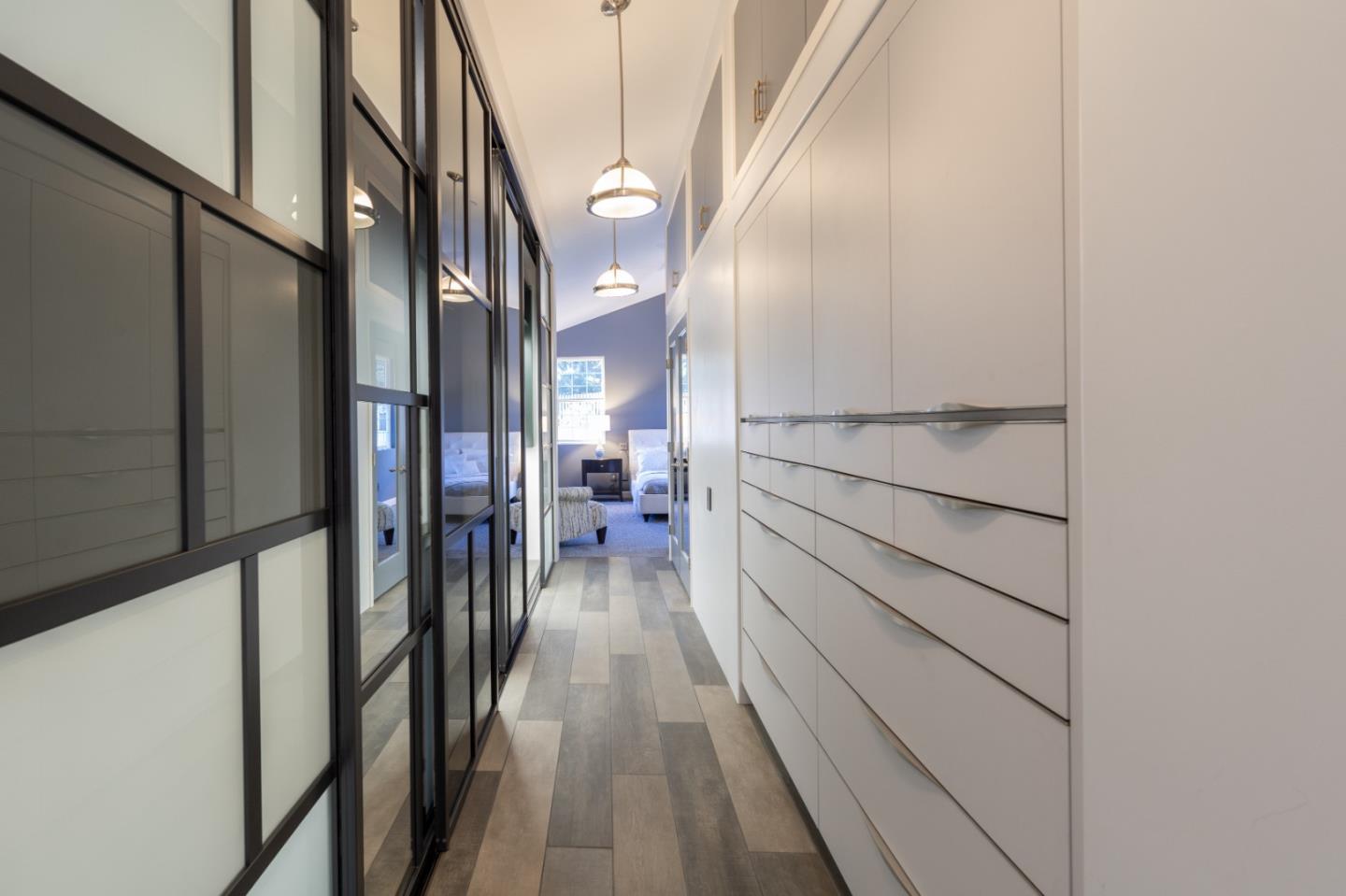 23715 Determine Lane Monterey, CA 93940 - Photo 22 of 43 a view of a hallway with wooden floor and staircase