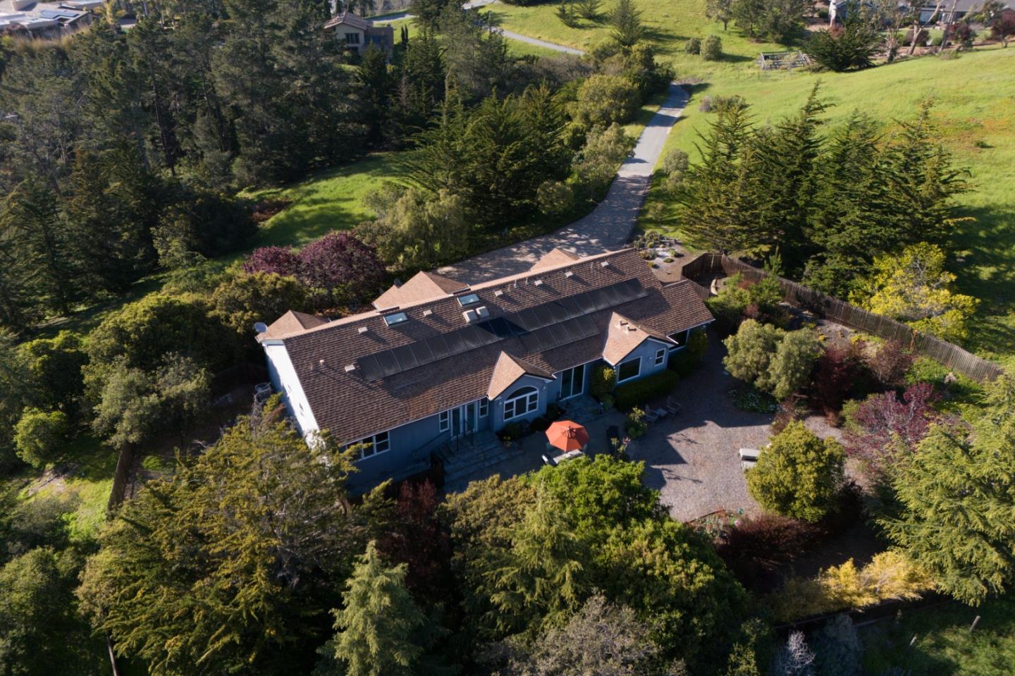 23715 Determine Lane Monterey, CA 93940 - Photo 42 of 43 an aerial view of a house with a yard