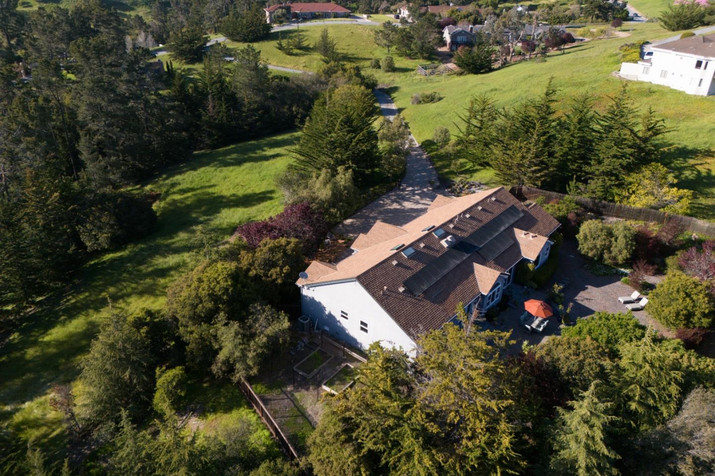 23715 Determine Lane Monterey, CA 93940 - Photo 43 of 43 an aerial view of house with yard swimming pool and outdoor seating