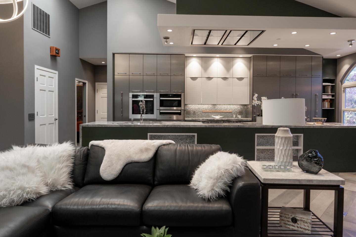 23715 Determine Lane Monterey, CA 93940 - Photo 7 of 43 a living room with furniture and kitchen view