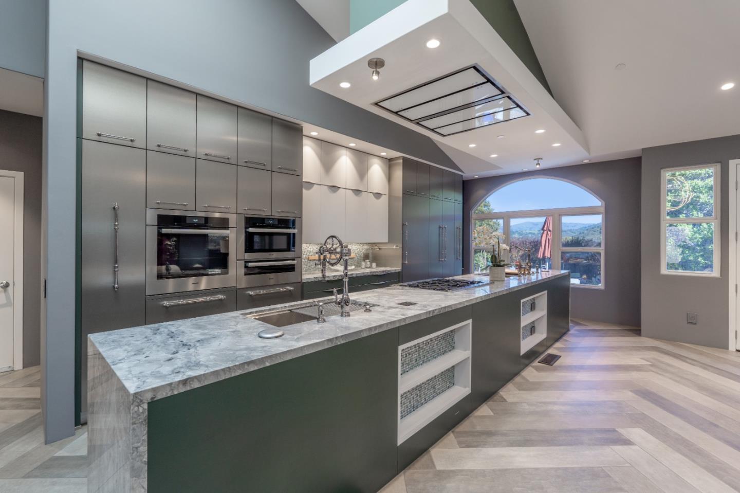 23715 Determine Lane Monterey, CA 93940 - Photo 8 of 43 a large kitchen with stainless steel appliances a large counter top